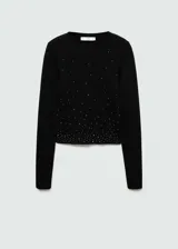 Jersey negro de punto fino con strass, cuello redondo y manga larga.