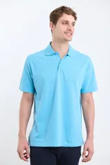Remera polo de piqué color verde agua.