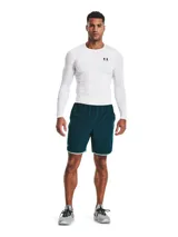 Remera de compresión Under Armour HeatGear de manga larga, color negro con logo blanco en el pecho.