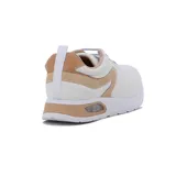 Championes deportivos Comfortflex de mujer, color blanco con detalles en color almendra y suela blanca.