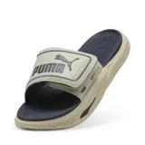 Sandalias Puma Softride Pro Slide 24, color beige con detalles en azul marino. Presentan una tira ancha con el logo de Puma y la tecnología Softride en la plantilla para mayor comodidad.