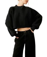 Sweater corto negro de punto acanalado con cuello alto, mangas largas abullonadas y corte holgado.