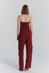 Pantalón cargo de cupro y viscosa con cordón elástico en la cintura y bolsillos laterales.