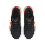 Championes Puma PWRFRAME de hombre, color negro con detalles en naranja y blanco.