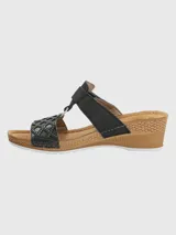 Sandalias Hush Puppies negras con plataforma de cuña y ajuste con velcro.
