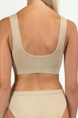 Soutien reductor color beige con breteles anchos y espalda deportiva.