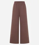 Pantalón marrón de algodón con forro de polar, corte ancho y cintura elástica.