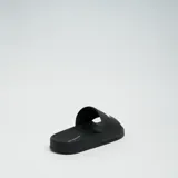 Sandalias tipo slider Chiara Ferragni de goma color negro, con diseño de ojo y estrella.