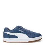 Championes urbanos Puma Caven 2.0, color blanco con detalles en verde y suela color caramelo.
