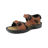 Sandalias de cuero color marrón con detalles en negro, ajuste con velcro y suela de goma.