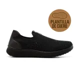 Zapatilla urbana negra de tejido de punto con apliques brillantes, plantilla de cuero y suela de goma.