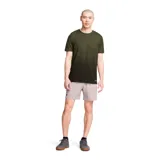 Short deportivo Under Armour Vanish Woven de hombre, color celeste con calza interior negra y logo estampado en la pierna izquierda.