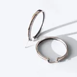 Aros tipo argolla en plata 925 y oro con circonias.