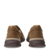 Zapatos casuales tipo mocasín Caterpillar Threshold, color marrón claro (beige natural), confeccionados en lona (canvas) con puntera y suela de goma marrón oscuro. Diseño sin cordones con elástico lateral para ajuste.