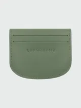 Tarjetero azul marino de cuero con logo de la marca grabado y botón dorado.