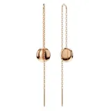 Par de aros colgantes Swarovski, bañados en tono oro rosa, con cadena fina y dije circular con incrustaciones de cristales blancos. Inspirados en el cosmos.