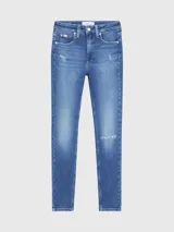 Jeans skinny de tiro alto color azul medio, con lavado gastado y roturas en las rodillas.