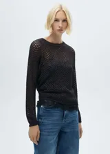 Sweater negro de tejido de punto calado con lúrex, cuello redondo y manga larga.
