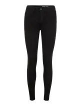 Pantalón de jean negro, tiro alto, corte skinny, cinco bolsillos y cierre frontal con botón.
