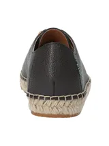 Zapatillas bajas de cuero color crema con cordones y plataforma de yute.