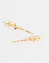 Set de dos horquillas doradas con apliques de perlas sintéticas en forma de flor y hojas.