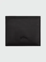 Billetera Longchamp de cuero color verde oliva, con diseño plegable y logo grabado en la parte inferior.