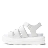 Sandalia beige con plataforma y tiras anchas cruzadas en el empeine.