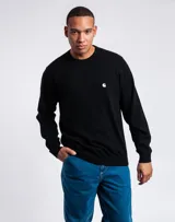 Sweater negro de tejido suave y corte clásico, ideal para uso diario.