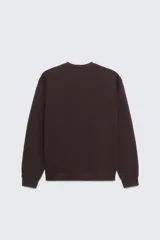 Sudadera negra de cuello redondo y manga larga, con bordado blanco en el frente que dice 'Zara A Coruña Established 1975 Rúa Juan Flórez 64-66' y un logo pequeño con el número 50 en la parte superior.