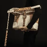 Ubud arena, camel y tostado