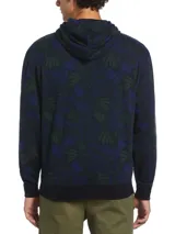 Buzo hoodie azul marino con estampado de hojas en tonos verde y azul. Tiene capucha con cordón ajustable, bolsillo tipo canguro y logo bordado en el pecho.