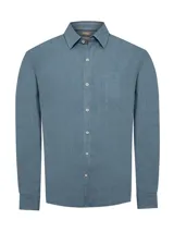 Camisa celeste de lino 100% con bolsillo en el pecho y logo bordado a tono.