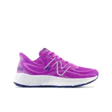 Championes de running New Balance Fresh Foam X 880v13, color fucsia con detalles en blanco y azul.