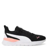 Championes de mujer de estilo deportivo, con parte superior de mesh en color negro y detalles en blanco y morado.