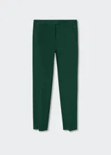 Pantalón negro de vestir, corte skinny, tiro medio, diseño crop, con bolsillos laterales y traseros de ribete.