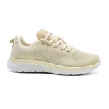 Championes deportivos American Sport Ikia, color negro con detalles en rosa y blanco, con capellada de tejido de punto y suela blanca.