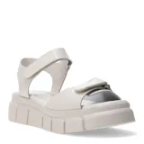 Sandalias de mujer marca Bottero en color beige, con plataforma alta y suela dentada. Cuentan con dos tiras ajustables mediante cierre de velcro, una en el empeine y otra en el tobillo.