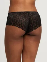 Conjunto de lencería Réne Rofé, compuesto por un soutien de encaje negro con microtul y un panty brasilero de encaje negro con microtul.