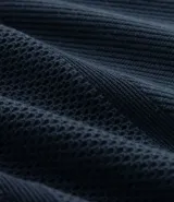 Buzo de hombre con cuello redondo, corte comfort, manga larga con puños ajustados y tejido texturizado.