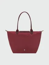 Bolso tote grande Longchamp modelo Le Pliage Green, color marrón chocolate, confeccionado en lona de nylon reciclado con detalles en cuero marrón y herrajes plateados.