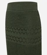 Pollera recta long midi color verde militar, con cintura elástica y confeccionada en tejido de punto con mix de puntos.