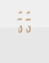 Set de tres pares de aros dorados con strass de colores. Incluye un par de aros tipo botón, un par de aros tipo barra y un par de aros tipo argolla.