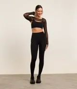 Calza legging deportiva color verde agua, de microfibra, con cintura ancha y bolsillos laterales.