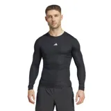Remera de training Adidas de compresión TECHFIT, color negro, con cuello redondo, mangas largas y logo blanco en el pecho.