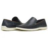 Mocasines de cuero color marrón habana, con detalle de costuras en contraste y suela de goma.