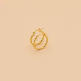 Aros tipo argolla en oro amarillo 18k, con diseño torneado.