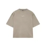 Remera oversize de algodón color beige con estampado gráfico en la espalda que incluye las letras "HC" estilizadas con estrellas y texto inferior que dice "VENERO CULTURE | COPYRIGHT 2022".