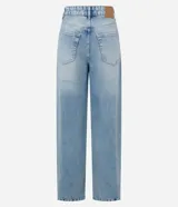 Pantalón baggy de jeans celeste con trabillas en la cintura, cierre tradicional y bolsillos. Corte holgado y de tiro alto.