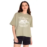 Remera amarilla de corte boxy con estampado de Caterpillar en el frente.