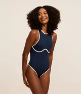 Body de lycra azul marino con textura acanalada, cuello redondo, sin mangas y bies contrastante blanco.